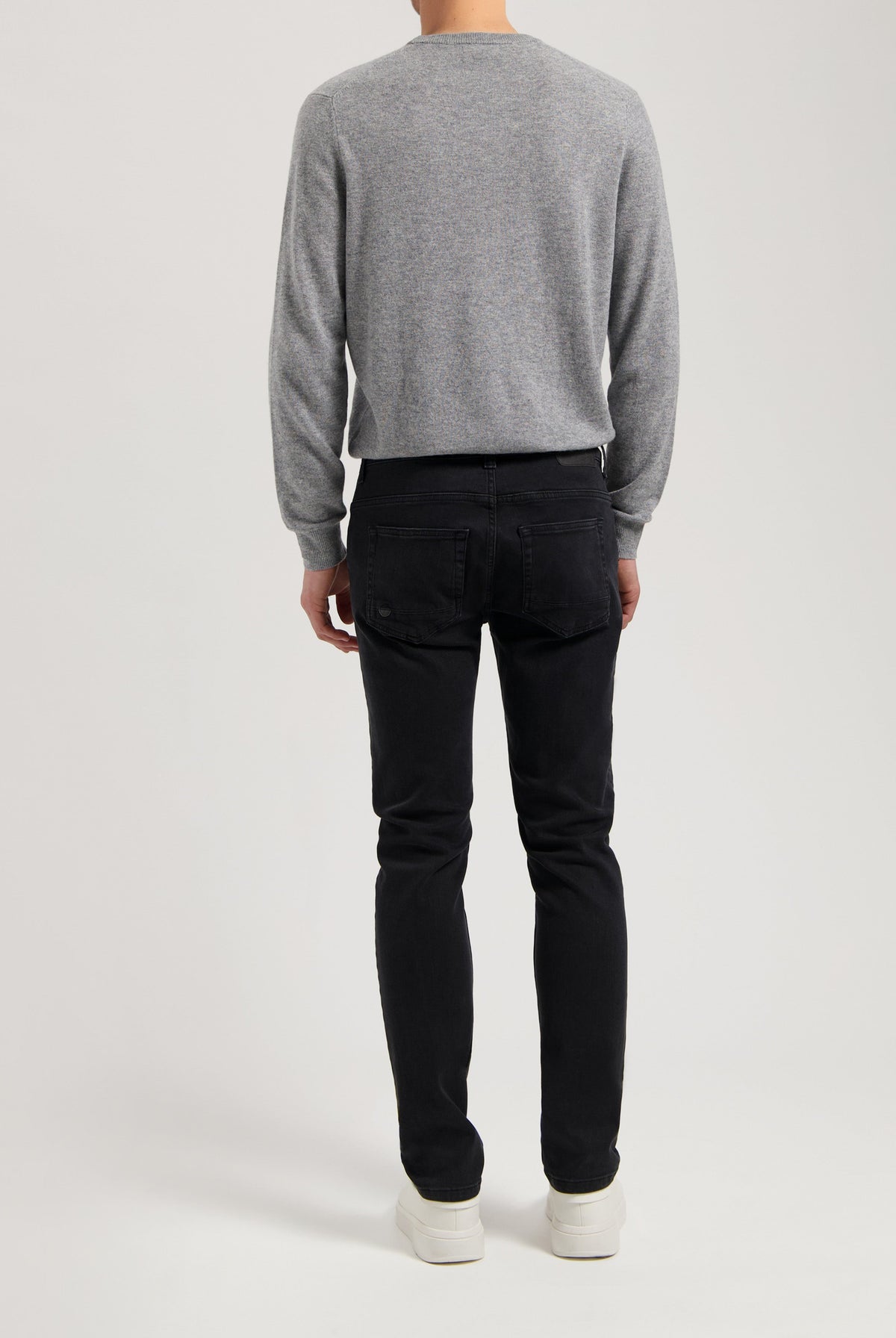 Sustainable MUD Jeans in deep blue denim, crafted from eco-friendly materials, featuring a modern slim fit and ethical design.