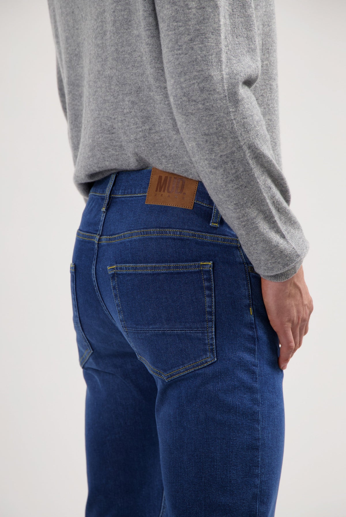 Sustainable MUD Jeans denim jacket made from ethical organic cotton, featuring classic blue wash and buttoned front.